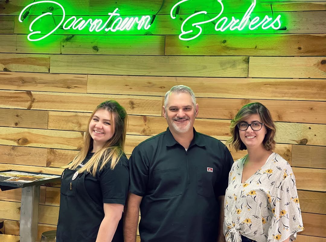Downtown Barbers 815 team — Phil, Quincy, and Franki